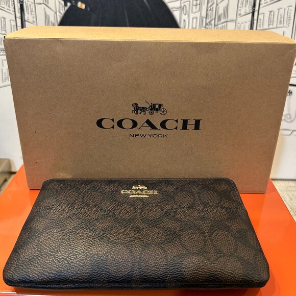 Coach Handbags - Coach Corner Zip Wristlet in Signature Canvas and Leather